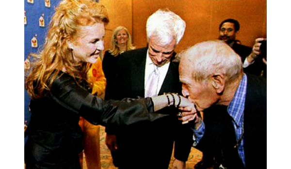 Paul Newman Kissing the hand of Sarah Ferguson